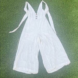 Chic Ivory Jumpsuit with Bow Accent